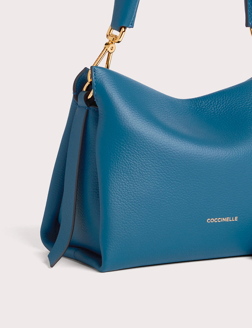 Borsa hobo piccola Boheme Coccinelle in blu profondo con pelle teal e hardware oro