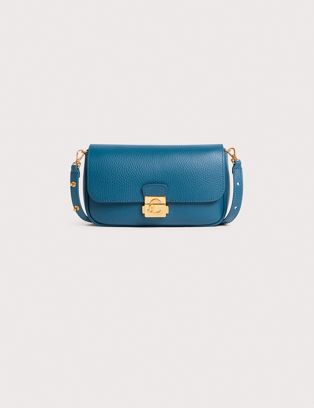 Borsa Coccinelle C-Me Lock Mini blu profondo in pelle teal ciottolata con hardware dorato e tracolla borchiata