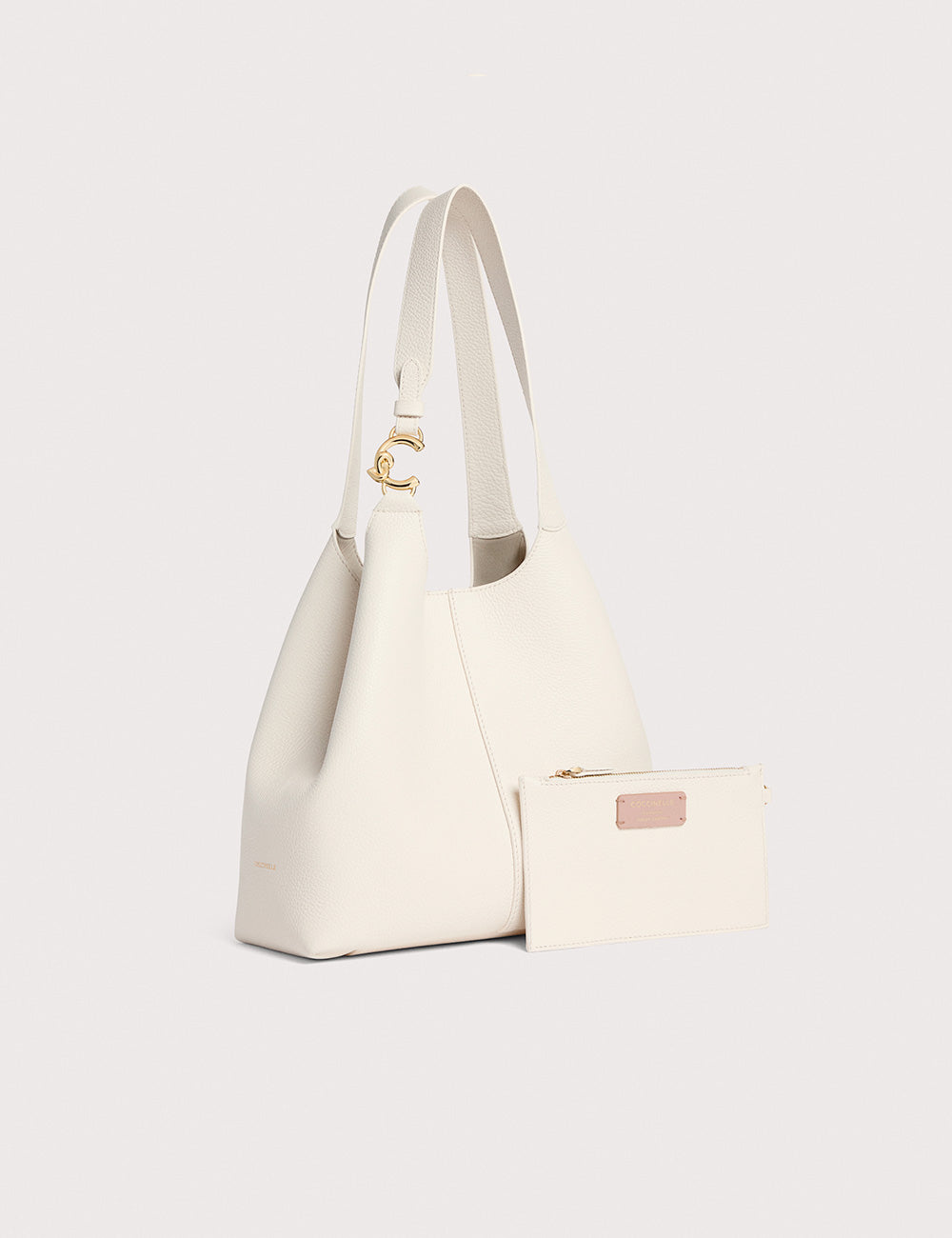 Borsa spalla Coccinelle C-Easy Pearl in pelle color crema con hardware dorato e portafoglio abbinato
