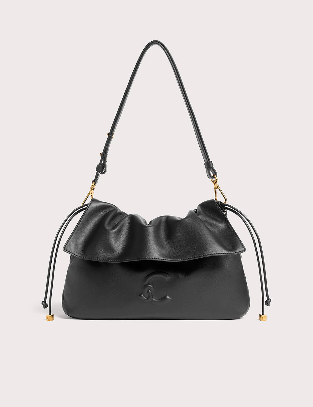 Borsa a spalla nera coccinelle lidia small in pelle con patta arricciata e dettagli oro sulle cinghie e coulisse