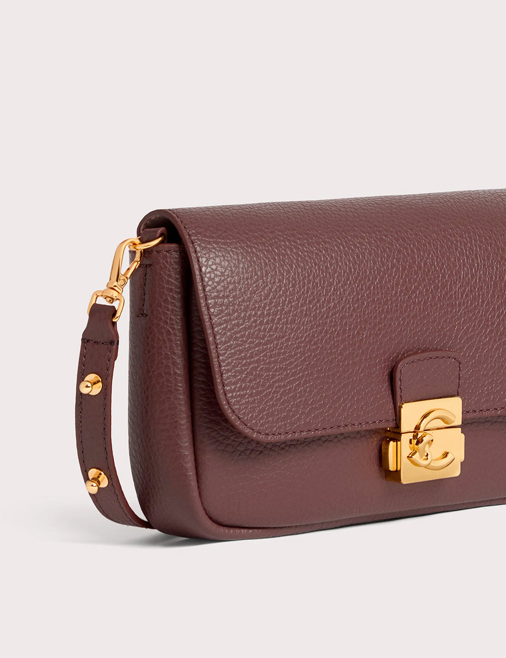 Coccinelle c-me lock mini berry borsa a tracolla in pelle bordeaux con fibbia logo e dettagli oro