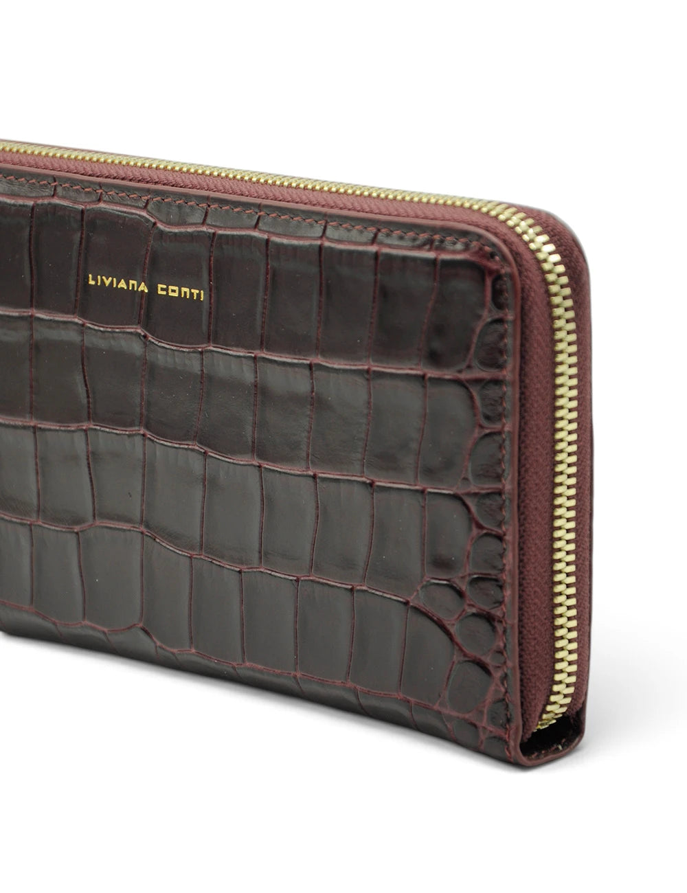 Portafogli liviana conti drew aubergine in pelle burgundy scura con stampa coccodrillo e zip oro