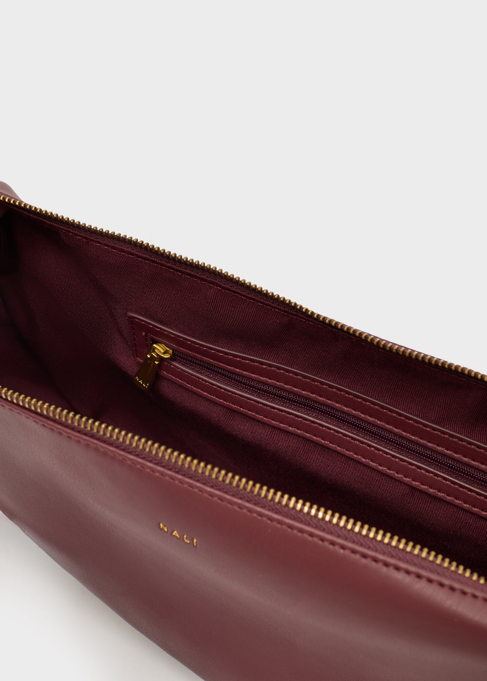 Nalì a spalla hailey viola borsa a tracolla in pelle burgundy con zip oro e logo discreto esterno