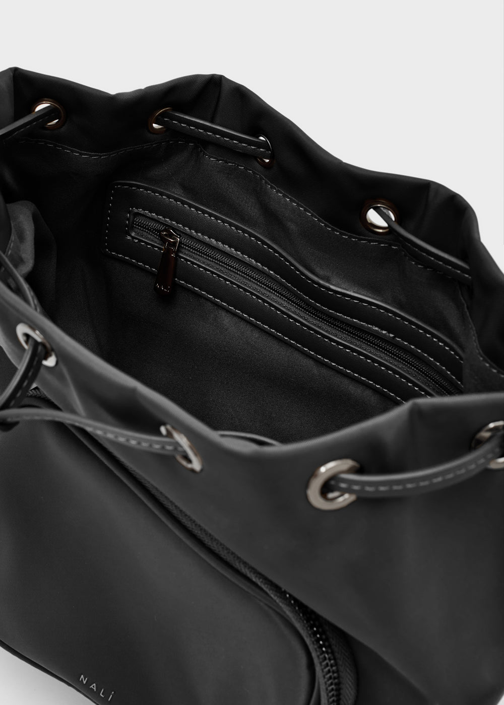 Black nylon drawstring bag nalì secchiello noor nero with silver metal hardware and zippered interior compartment