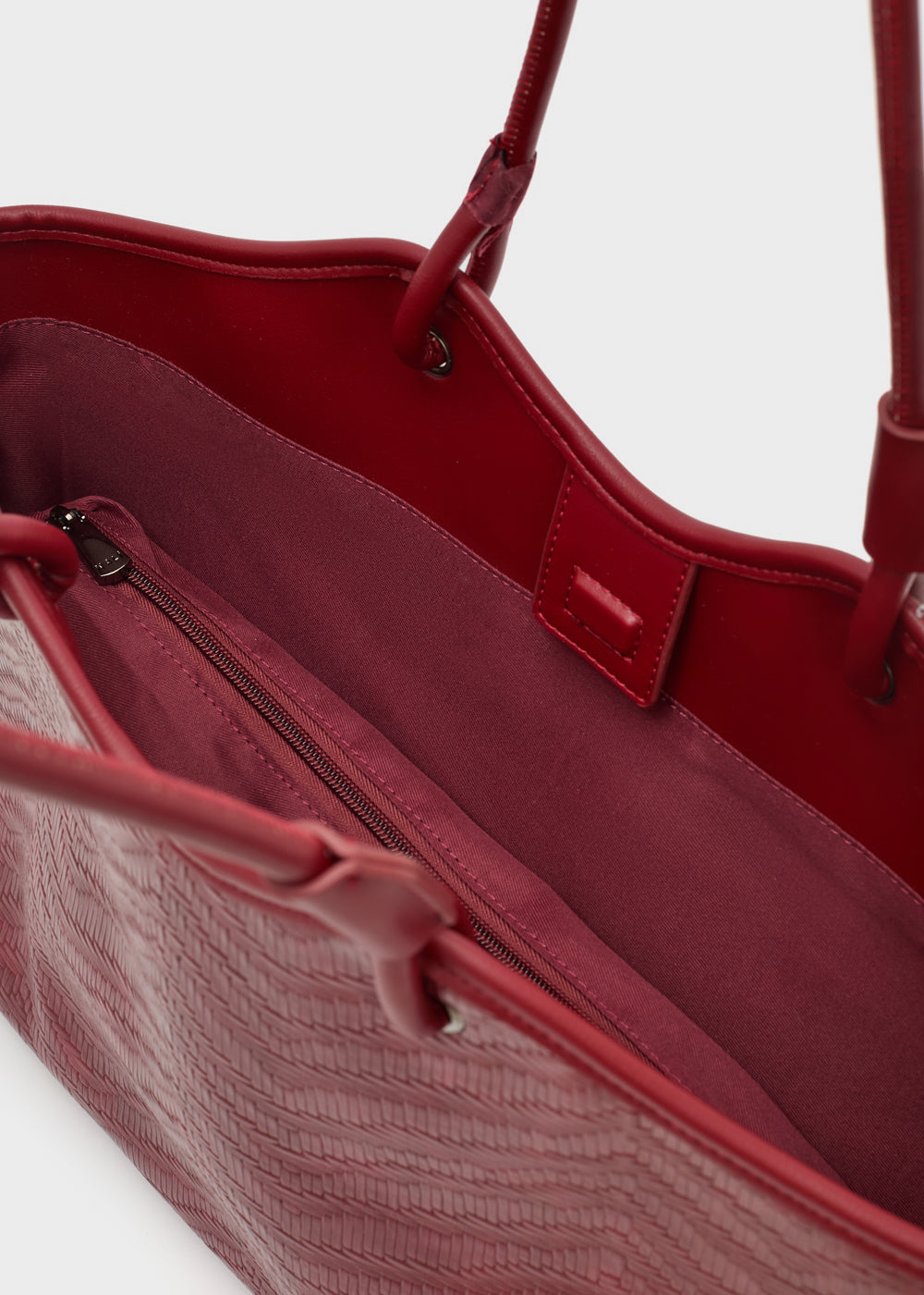 Red tote bag in textured leather with zipper compartment and matching handles nalì a spalla muse bordeaux