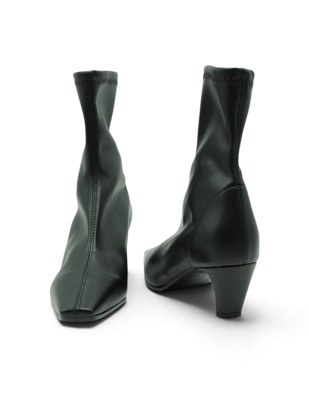 Bianca di stivaletto nero in pelle nera con design minimalista e tacco basso a blocco