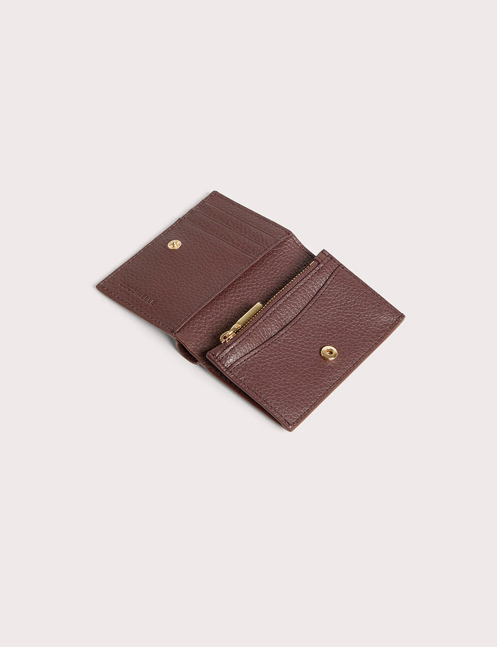 Compatto portafogli coccinelle metallic small berry in pelle bordeaux strutturata con zip e dettagli oro
