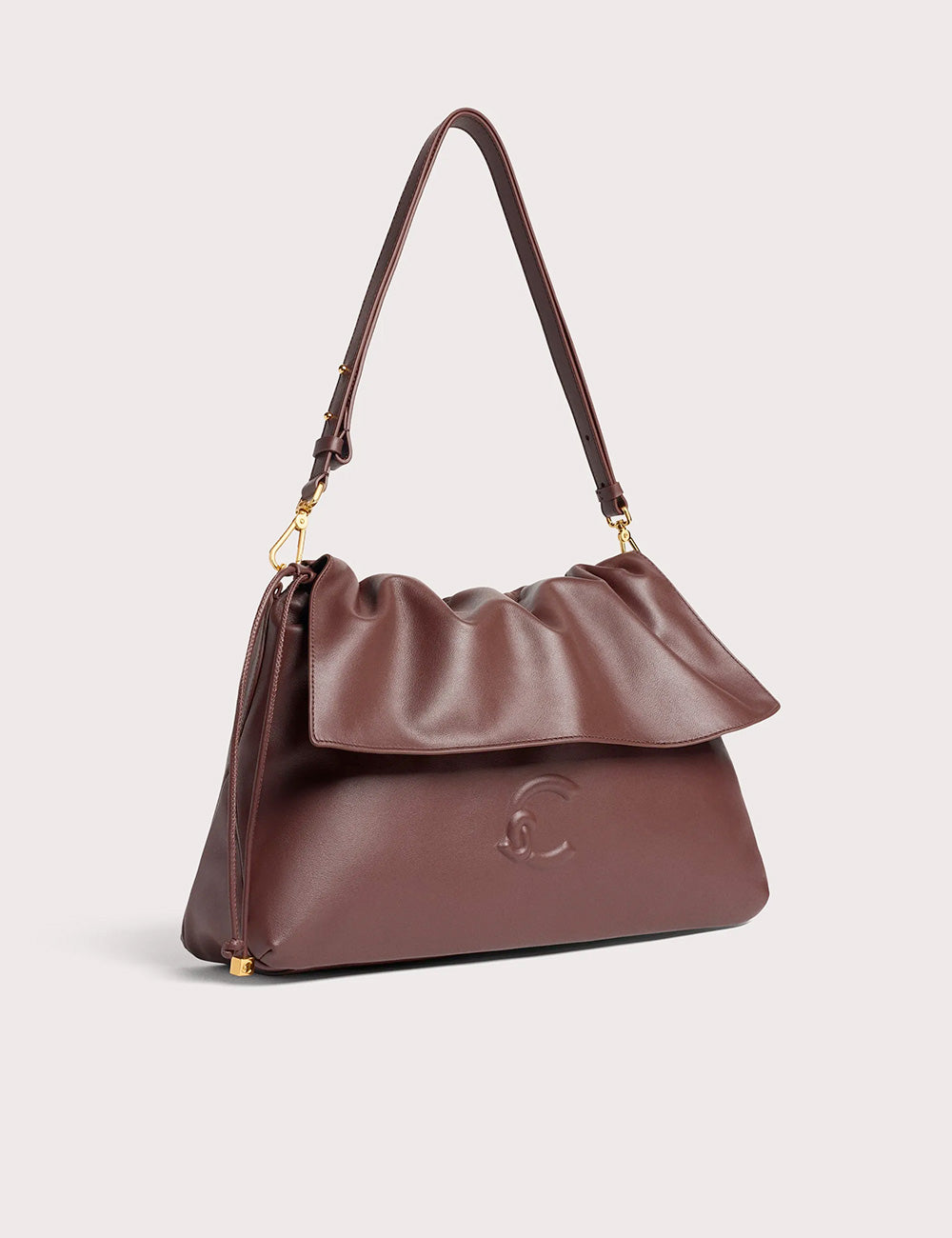 Coccinelle lidia medium berry borsa a tracolla in pelle bordeaux con patta arricciata e dettaglio oro