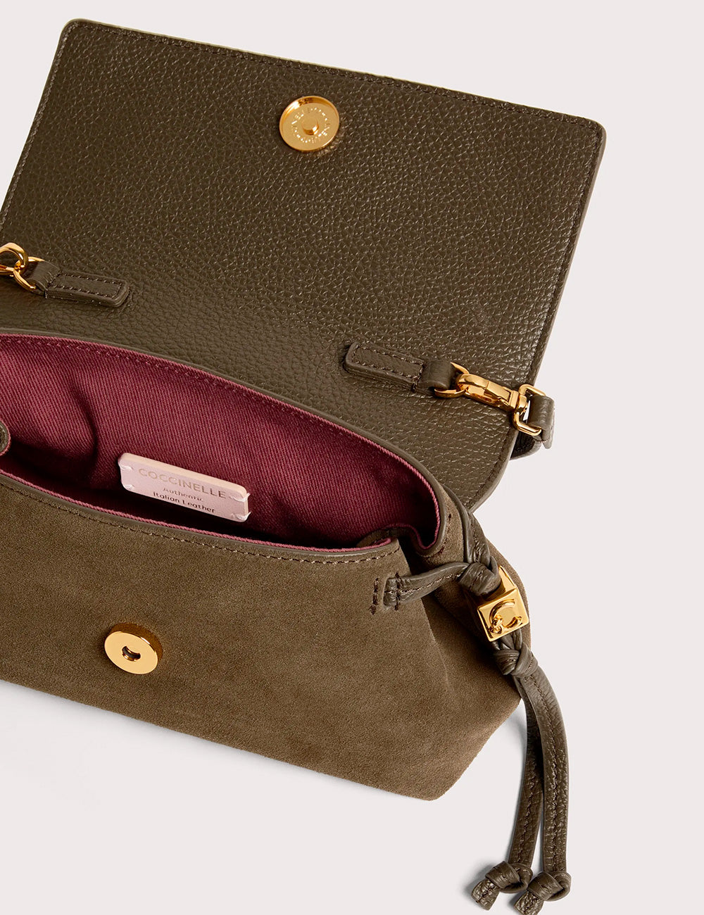 Olive green suede crossbody bag coccinelle thess suede mini fango with gold hardware and maroon interior lining