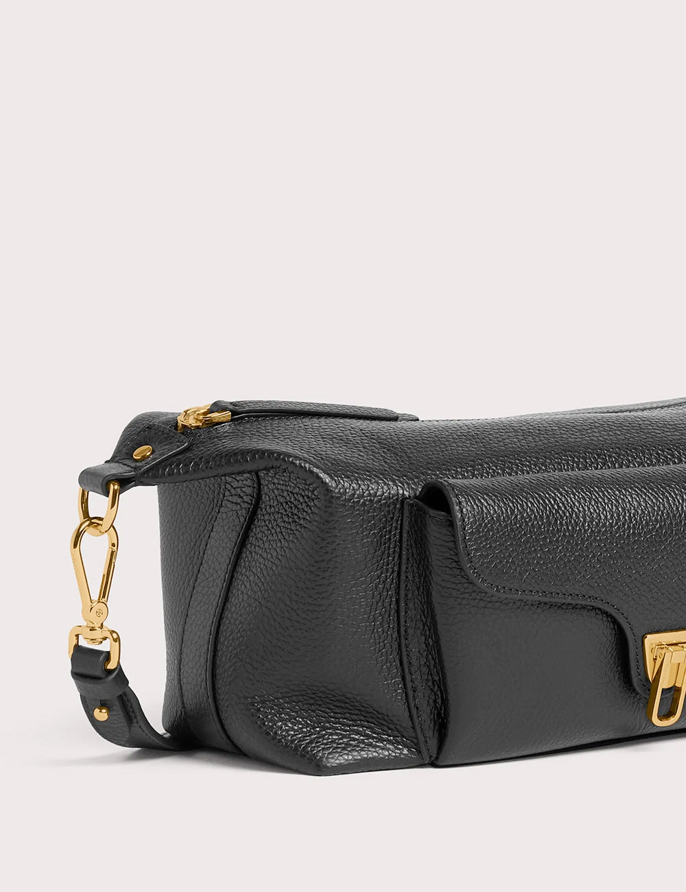Black pebbled leather crossbody bag with gold-tone hardware and detachable chain strap from coccinelle tracolla beat generation noir