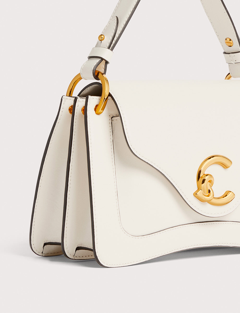 Borsa Coccinelle C-Me Pearl in pelle bianca con chiusura logo C oro