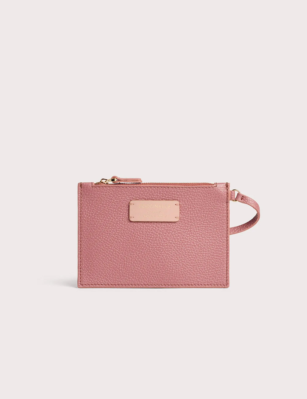 Coccinelle c-easy small wristlet in soft pink textured leather with matching zipper and metal plate in front