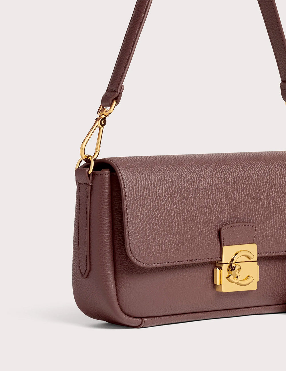 Brown textured leather crossbody bag coccinelle c-me lock medium berry with gold-tone hardware and logo clasp