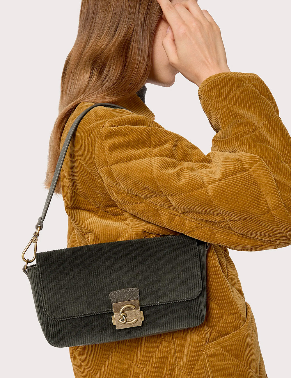 Dark green corduroy crossbody bag coccinelle c-me lock medium fango with gold-tone cc logo clasp