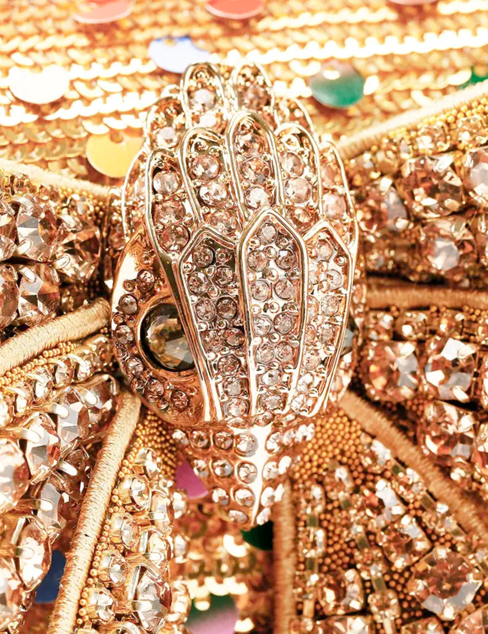 Spilla a forma di mano in oro rosa con cristalli rosa e trasparenti Kurt Geiger Tracolla Small Bow Shoreditch