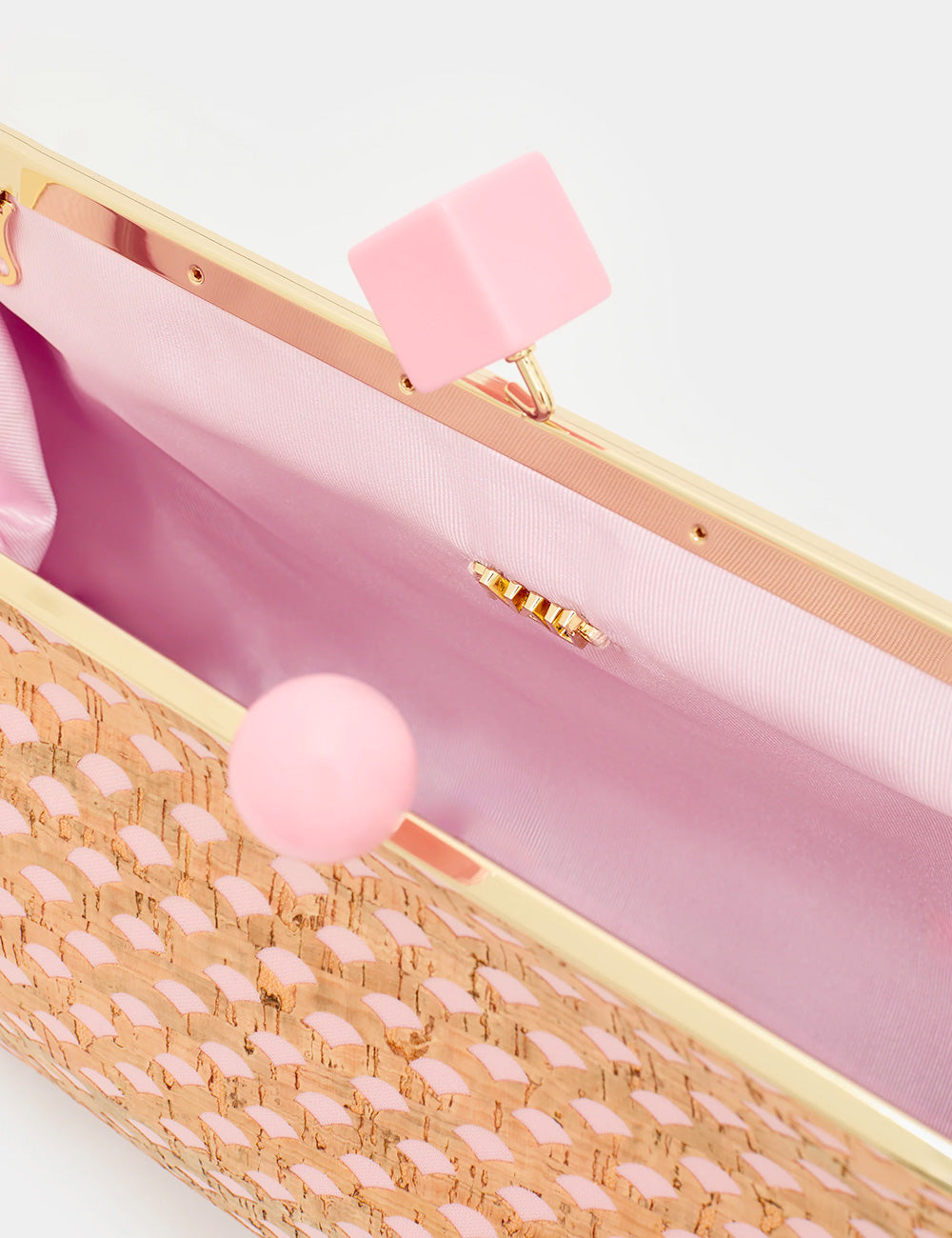 Pochette Nadia Rosa Nalì con trama fenicotteri rosa, cornice oro e pompon rosa