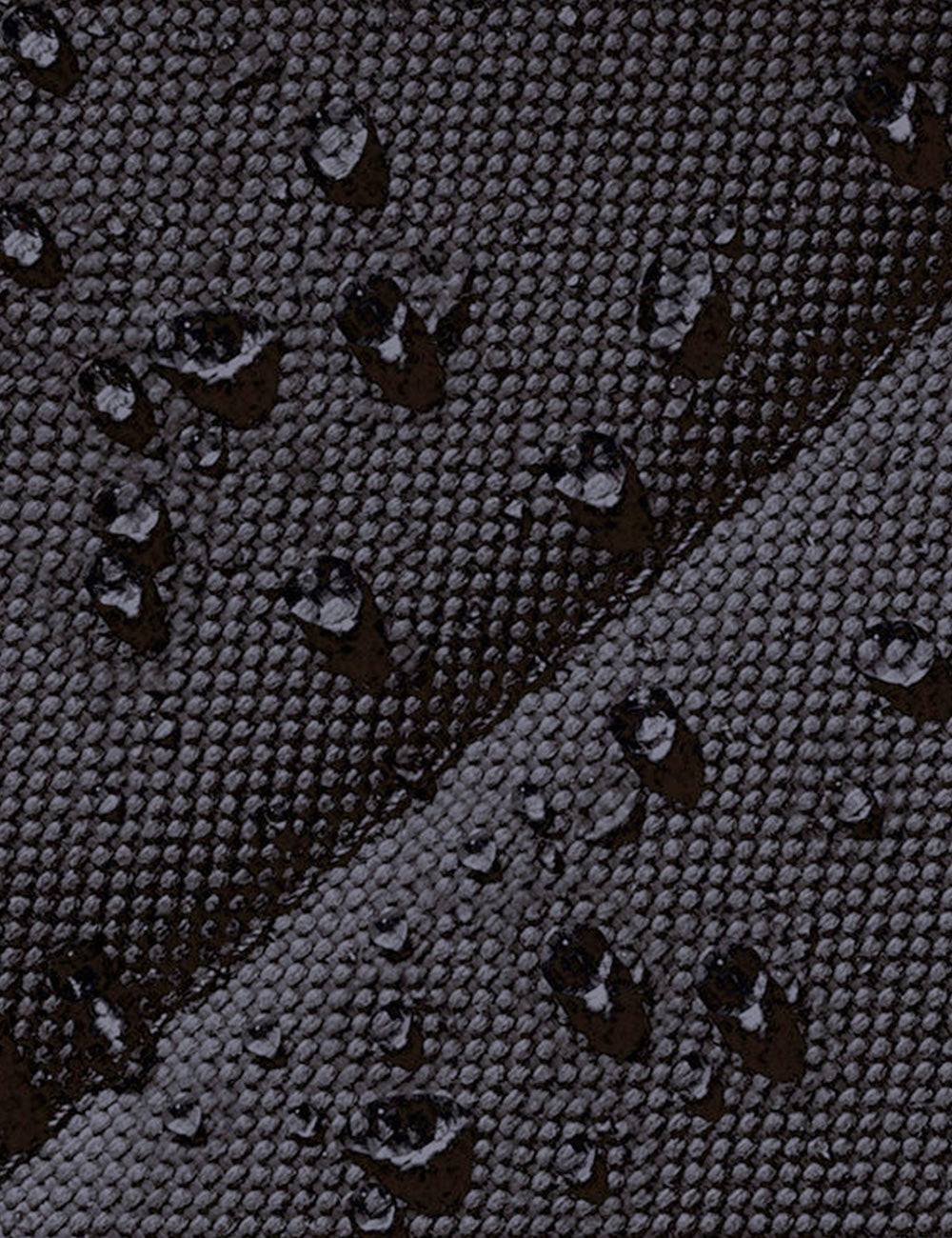 Tessuto scuro grigio ucon acrobatics hajo dark sand black con motivo tessuto e gocce d’acqua scintillanti